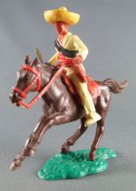 Timpo - Mexicains - Cavalier ceinture séparée pose du couteau veste jaune pantalon jaune sombrero jaune cheval brun galop court