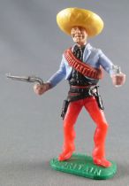 Timpo - Mexicains - Piéton 2 mains à hauteur de la taille veste bleue 2 révolvers sombrero jaune jambes rouges pied droit devant