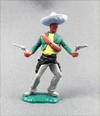 Timpo - Mexicains - Pi�ton 2 mains � hauteur de la taille veste verte (2 r�volvers) sombrero bleu jambes grises pied droit vers 