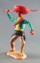 Timpo - Mexicains - Piéton bras droit levé veste verte (fouet) sombrero rouge jambes crèmes pied droit vers la droite