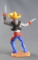 Timpo - Mexicans - Footed left arm raised grey jacket (2 pistols) yellow hat blue legs with right foot pointing to the right