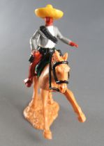 Timpo - Mexicans - Mounted (moulded belt) holding knive grey jacket brown legs yellow hat ligt brown galloping horse 