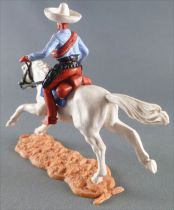 Timpo - Mexicans - Mounted (moulded belt) holding winchester blue jacket brown legs white hat white galloping (long) horse