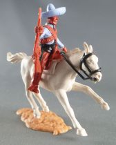 Timpo - Mexicans - Mounted (moulded belt) right arm pointing blue jacket (winchester) brown legs blue hat white galloping (short