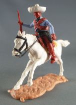 Timpo - Mexicans - Mounted (moulded belt) right arm pointing blue jacket (winchester) brown legs white hat white galloping (long