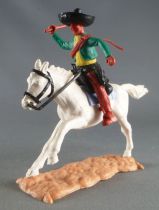 Timpo - Mexicans - Mounted (moulded belt) right arm raised green jacket (whip) brown legs black hat white galloping (long) horse