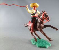 Timpo - Mexicans - Mounted (moulded belt) right arm raised yellow jacket (whip) brown legs yellow  hat dark brown galloping (sho