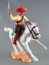 Timpo - Mexicans - Mounted (moulded belt) right arm up yellow jacket (pistol) brown legs red hat white galloping horseg 