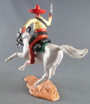 Timpo - Mexicans - Mounted (moulded belt) right arm up yellow jacket (pistol) brown legs red hat white galloping horseg 