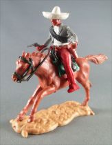 Timpo - Mexicans - Mounted (separate belt) both hands at waist height grey jacket (2 pistols) red legs white hat brown galloping