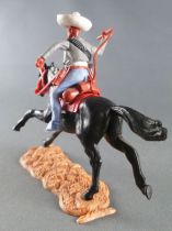 Timpo - Mexicans - Mounted (separate belt) right arm raised grey jacket (whip) blue legs white hat black galloping (long) horse