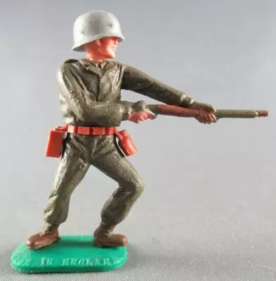 Timpo - WW2 - Americans - 1st series - Firing rifle waist standing leaning to the left legs