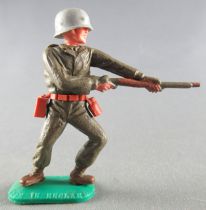 Timpo - WW2 - Americans - 1st series - Firing rifle waist standing leaning to the left legs