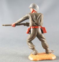 Timpo - WW2 - Americans - 1st series - Firing rifle waist standing leaning to the left legs sand base