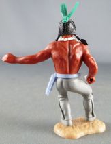 Timpo Indians 3rd series (1 piece head - knife belt) footed left arm outstreched (knife) bent legs (grey) green feathers