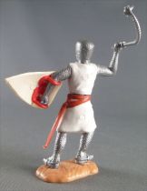 Timpo Middle-Age Crusader 2nd serie footed attacking right arm raised (mace) leaning to the right legs