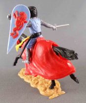 Timpo Moyen-Age chevaliers médievaux cavalier bleu ciel épée cheval noir galop long caparaçon rouge