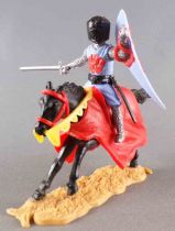 Timpo Moyen-Age chevaliers médievaux cavalier bleu ciel épée cheval noir galop long caparaçon rouge