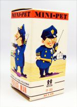 Wind-Up - MIni-Pet Tomy - Police Man (mint in box)